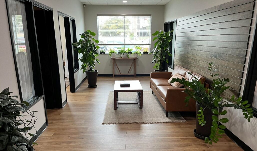 Oakwood Counseling - A Counseling & Assessment Center Lobby at Oakwood Counseling with couch and coffee table